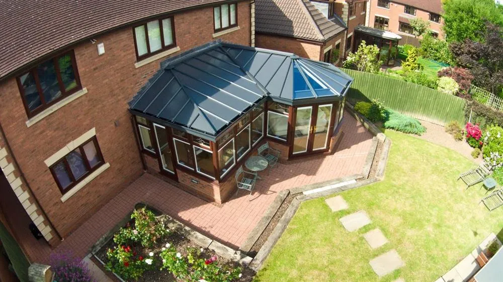 p-shaped conservatory anthracite poycarbonate roof replacement