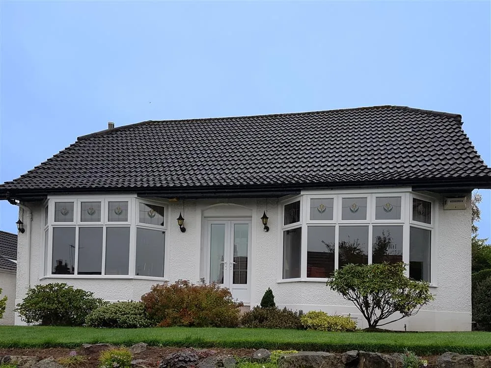 external bay and bow windows white bungalow