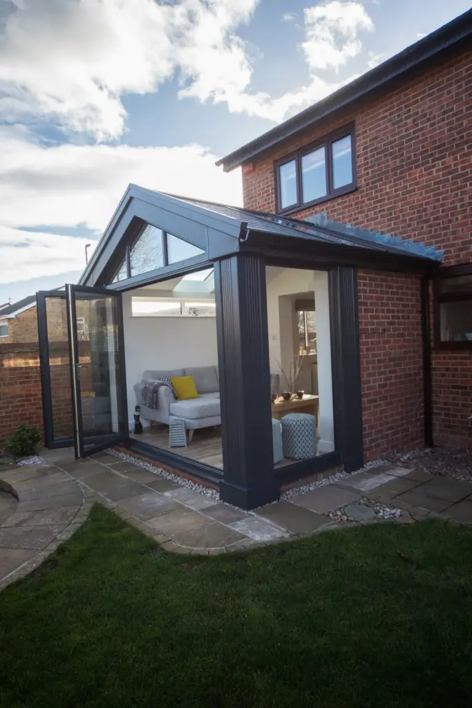 gable conservatory sliding doors on red brick house