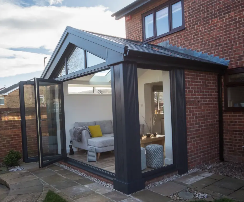 gable conservatory sliding doors on red brick house