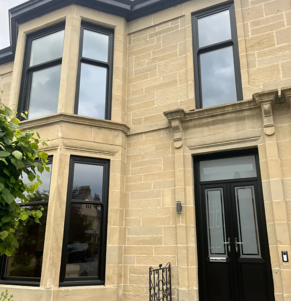 upvc black sliding sash and case windows with door install on town house