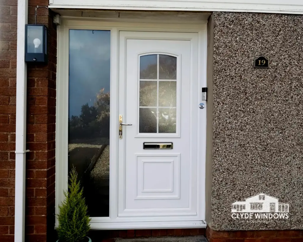 white upvc front door with sidepanel