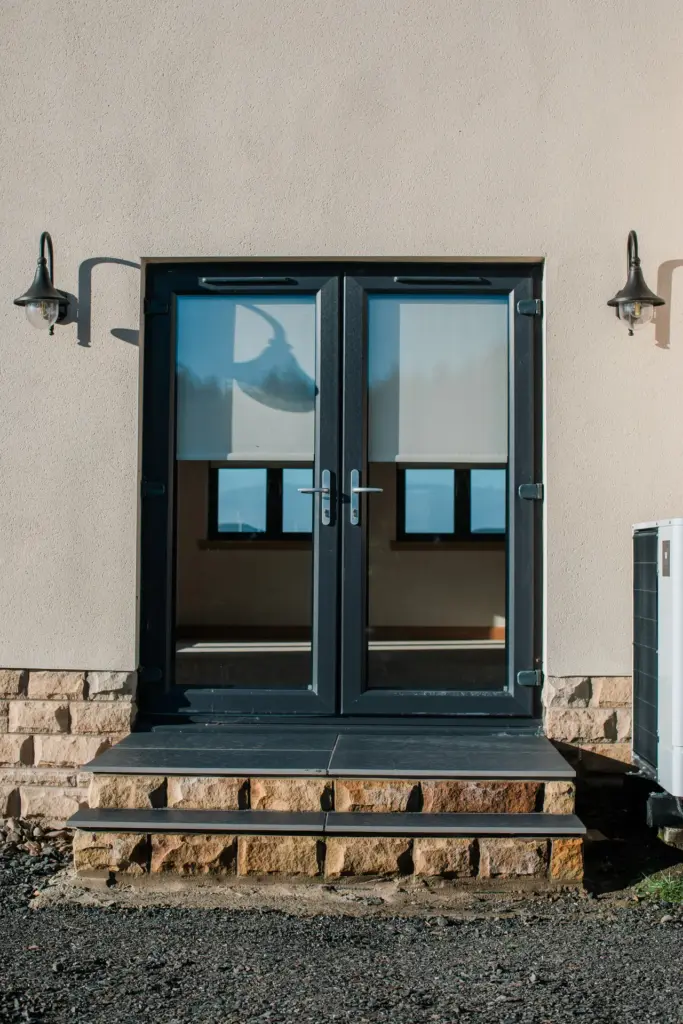 anthracite french door with natural stone stairs