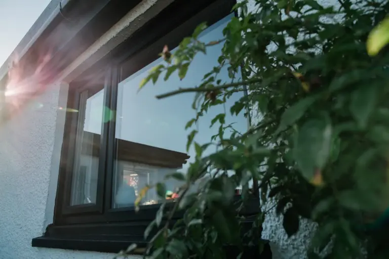 brown upvc casement window on bugalow