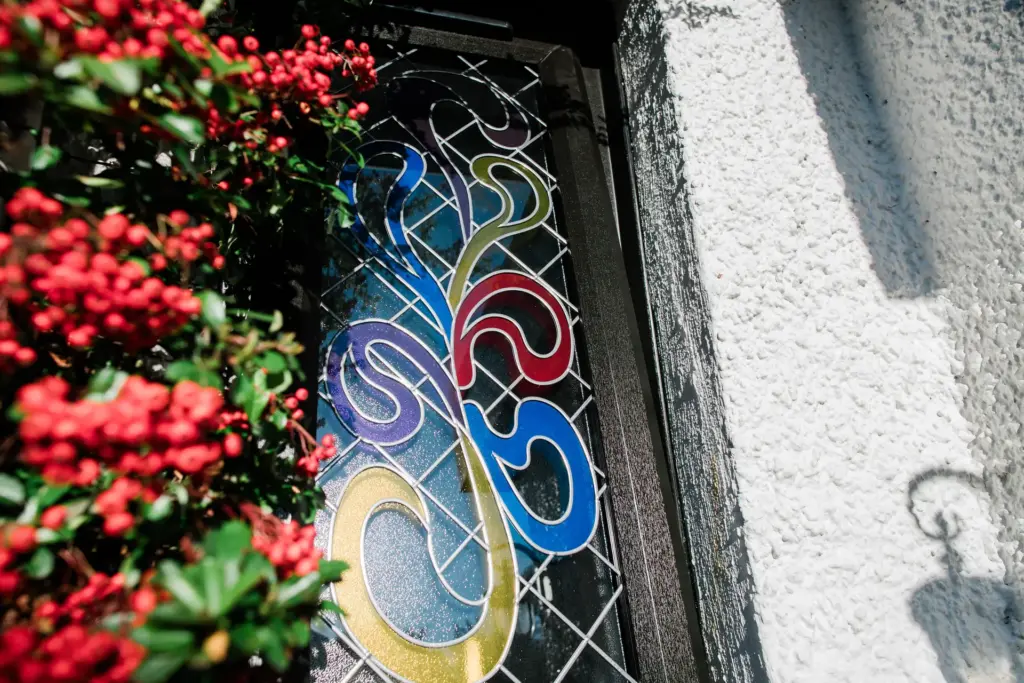 stained glass art red blue yellow purple