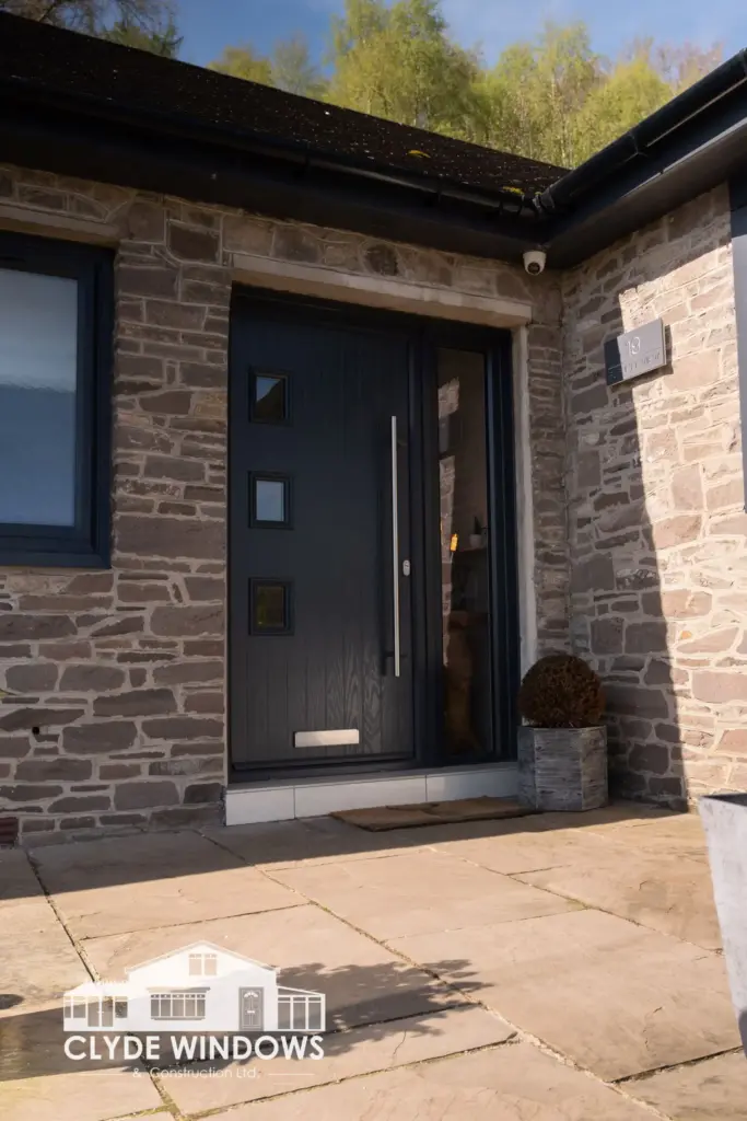 gouldings garden centre grey composite front door glazed panels stone exterior scotland